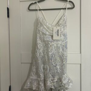 NWT  Saints and Secrets White Sequin Dress with Ruffle Hem